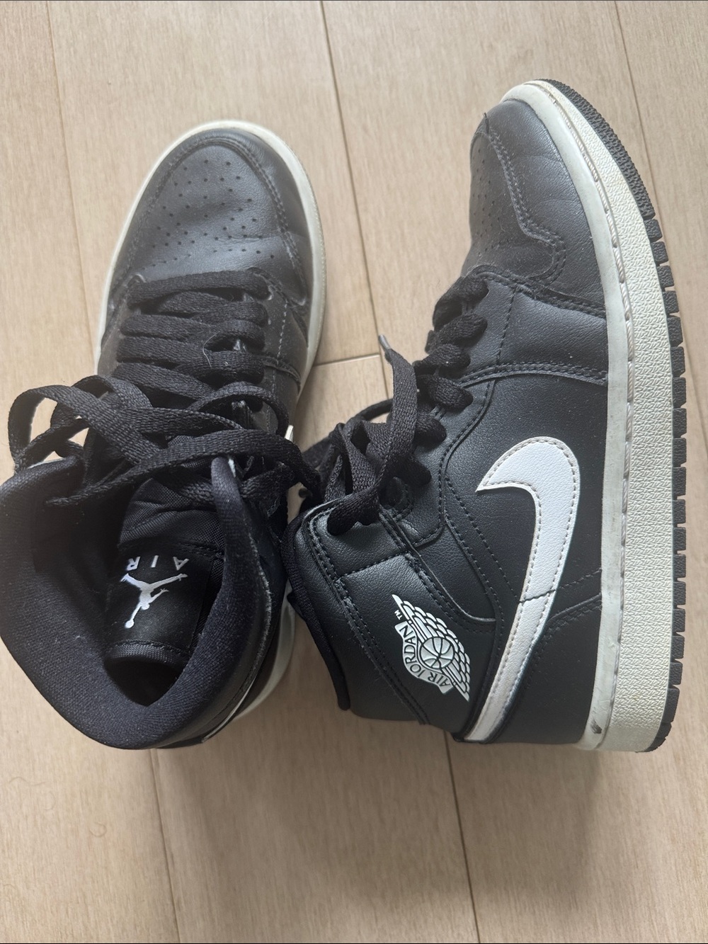 Air Jordan 1 Retro Mid Black and White Panda Sneakers